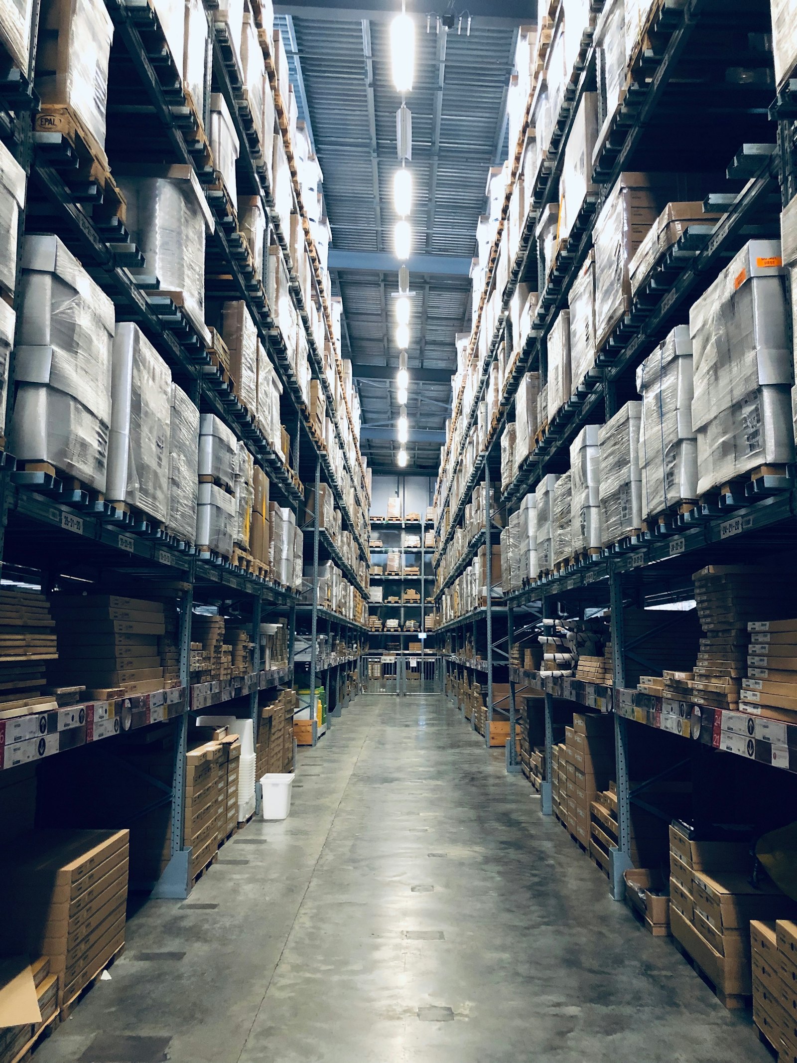 Warehouse logistics operation with stacked inventory